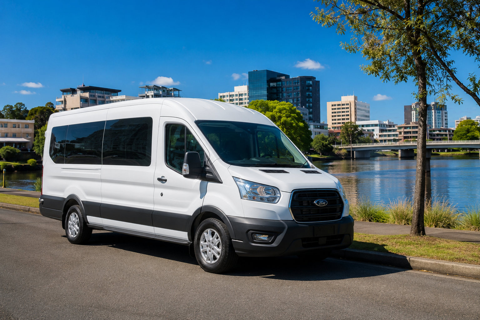 White Ford Transit 18 seater minibus parked by Hamilton river, New Zealand